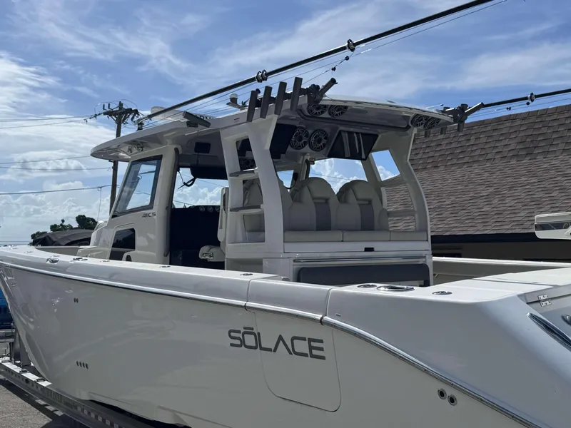 Slide: The Image of 2023 Solace 41 CS boat with sleek design and advanced features. - 4