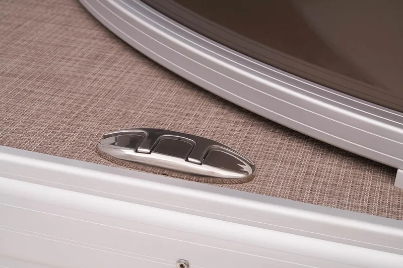 Slide: The Image of Close-up of 2023 Sun Tracker SportFish 22 DLX boat's sleek metallic cleat. - 15