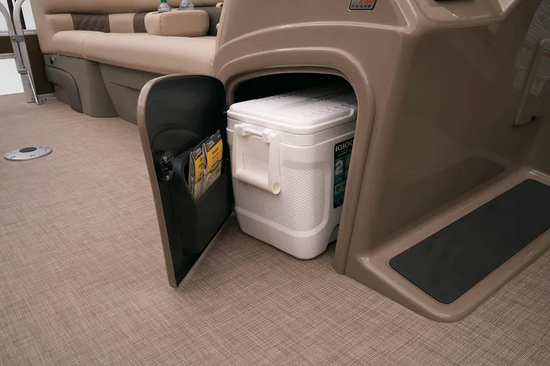 Slide: The Image of Built-in cooler storage on the 2023 Sun Tracker SportFish 22 DLX pontoon boat. - 22