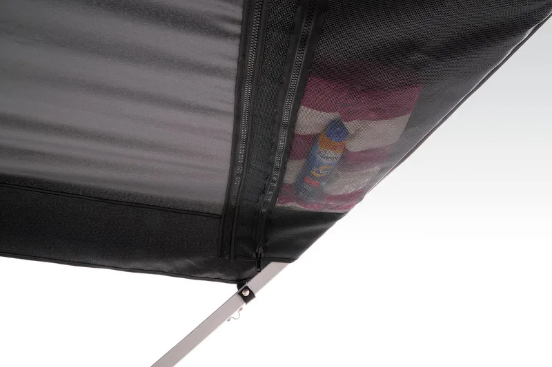 Slide: The Image of Sun Tracker SportFish 22 DLX 2023 storage compartment with zipper and mesh cover. - 30