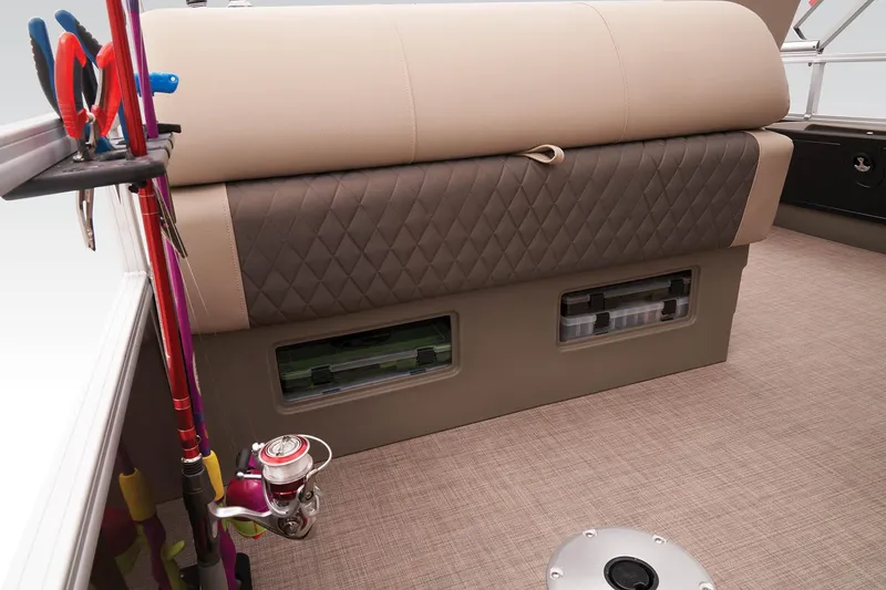 Slide: The Image of 2023 Sun Tracker SportFish 22 DLX interior with fishing rod holders and storage compartments. - 32