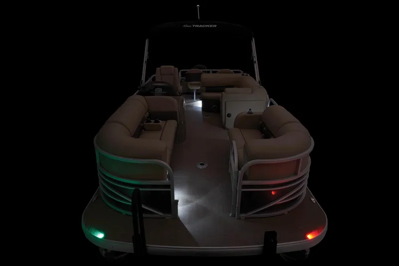 Slide: The Image of 2023 Sun Tracker SportFish 22 DLX pontoon boat with interior lighting. - 45