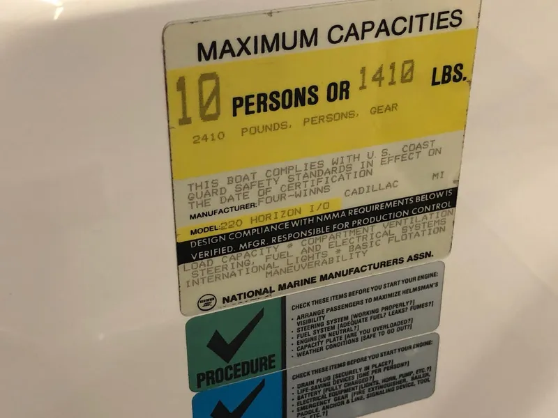 Slide: The Image of 1992 Four Winns 220 Horizon Open Bow maximum capacity label, 10 persons or 1410 lbs. - 13