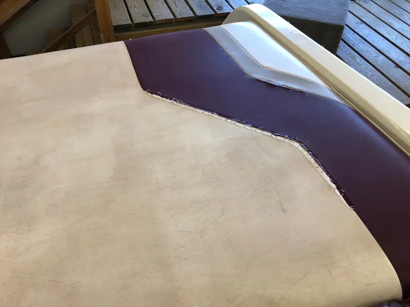 Slide: The Image of Damaged upholstery on a 1992 Four Winns 220 Horizon Open Bow boat. - 20