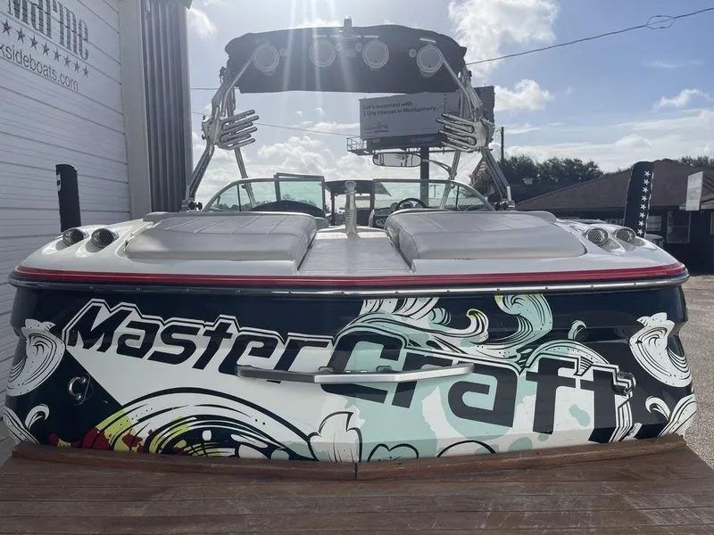 Slide: The Image of 2008 MasterCraft X45 boat with custom graphics, rear view. - 4