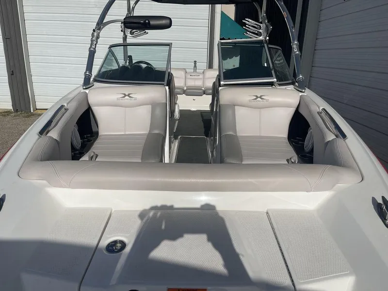 Slide: The Image of 2008 MasterCraft X45 boat interior with white and gray seating. - 5