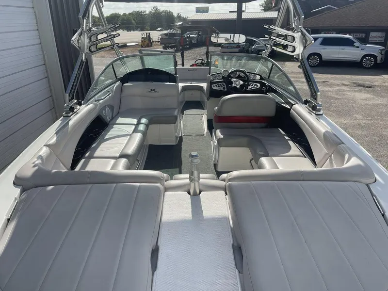 Slide: The Image of 2008 MasterCraft X45 boat interior with spacious seating and modern dashboard. - 6