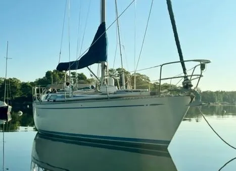 The Image of 1981 Nautor Swan 371 Sloop on calm water, showcasing sleek design and elegant lines. - 0