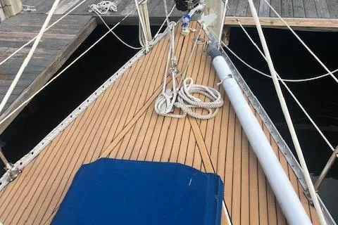 Slide: The Image of 1981 Nautor Swan 371 Sloop deck with ropes and wooden finish. - 19