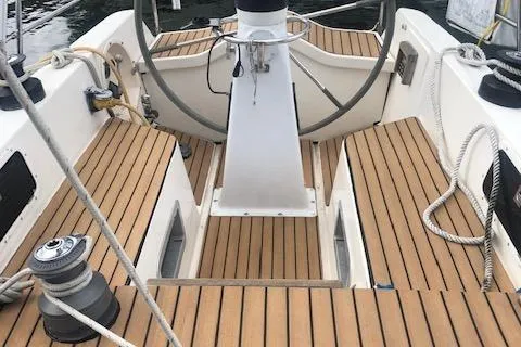 Slide: The Image of Cockpit of 1981 Nautor Swan 371 Sloop with wooden deck and steering wheel. - 22