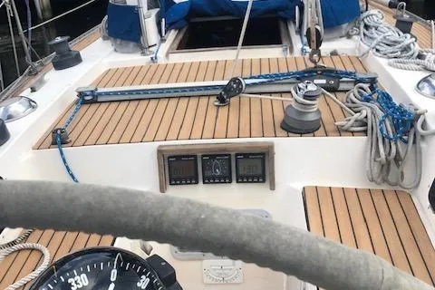 Slide: The Image of Cockpit of 1981 Nautor Swan 371 Sloop with teak decking and navigation instruments. - 23