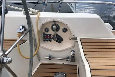 Slide: The Image of Cockpit of 1981 Nautor Swan 371 Sloop with wooden deck and control panel. - 25