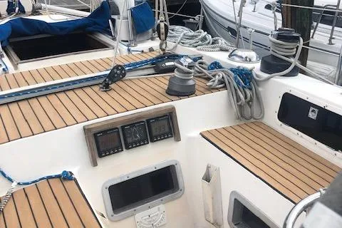 Slide: The Image of 1981 Nautor Swan 371 Sloop cockpit with teak decking and navigation instruments. - 27