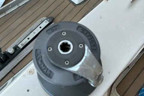 Slide: The Image of Winch on 1981 Nautor Swan 371 Sloop deck, featuring Lewmar branding. - 33