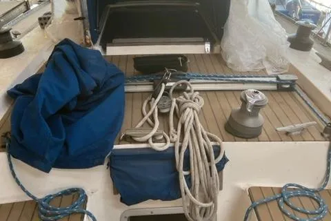 Slide: The Image of 1981 Nautor Swan 371 Sloop deck with ropes and winch. - 37