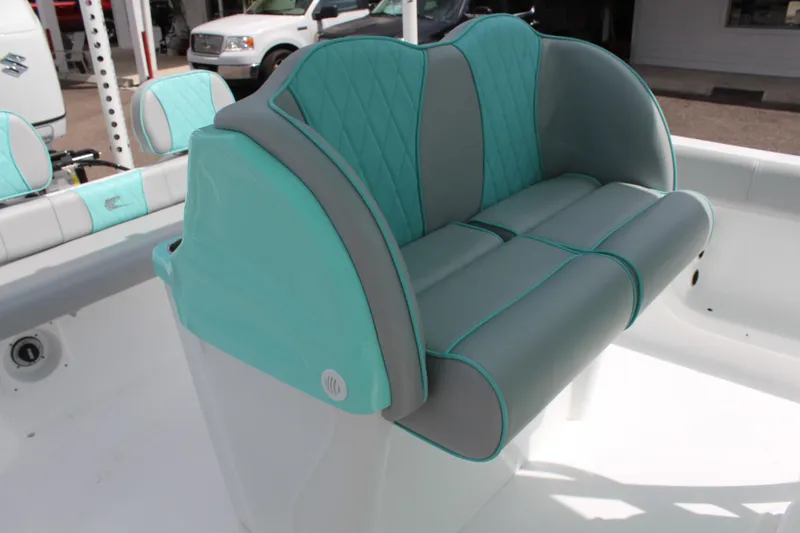 Slide: The Image of 2022 ALK2 Powerboats 25 CRX, teal and gray cushioned seating - 22