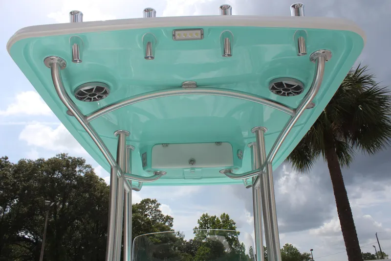 Slide: The Image of 2022 ALK2 Powerboats 25 CRX, turquoise T-top with speakers and rod holders. - 26