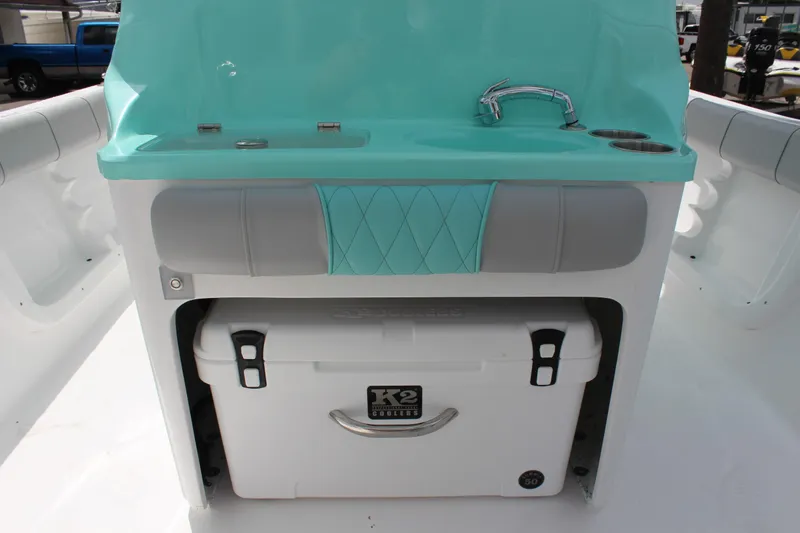 Slide: The Image of 2022 ALK2 Powerboats 25 CRX with built-in cooler and sink. - 27