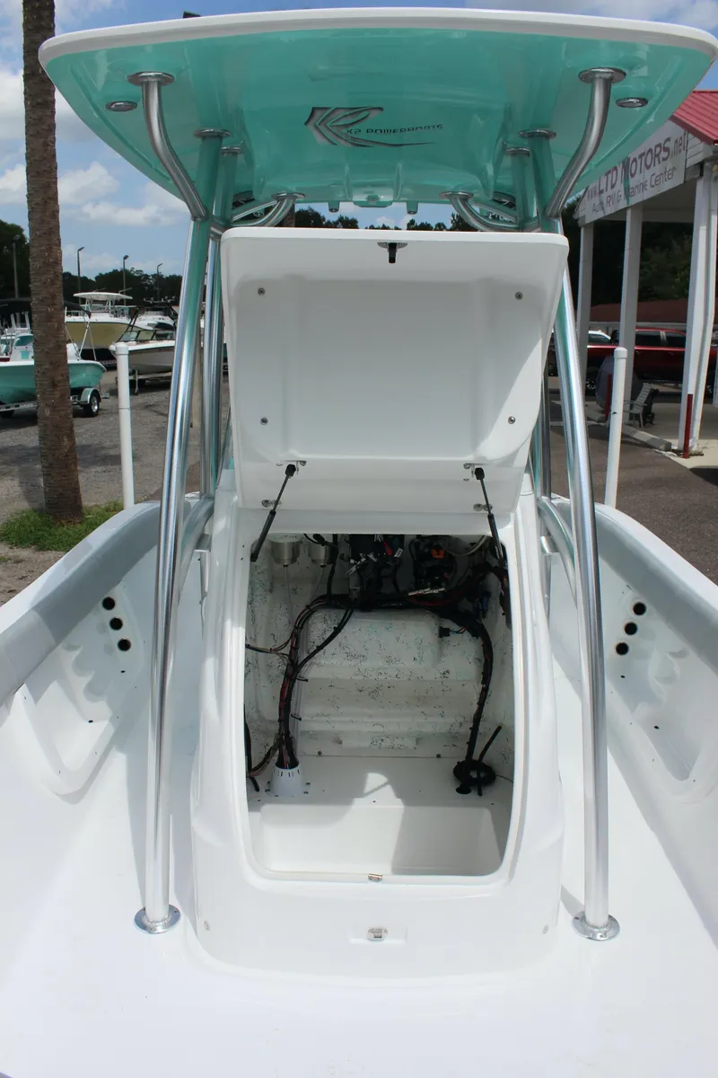 Slide: The Image of 2022 ALK2 Powerboats 25 CRX center console with open storage compartment. - 29