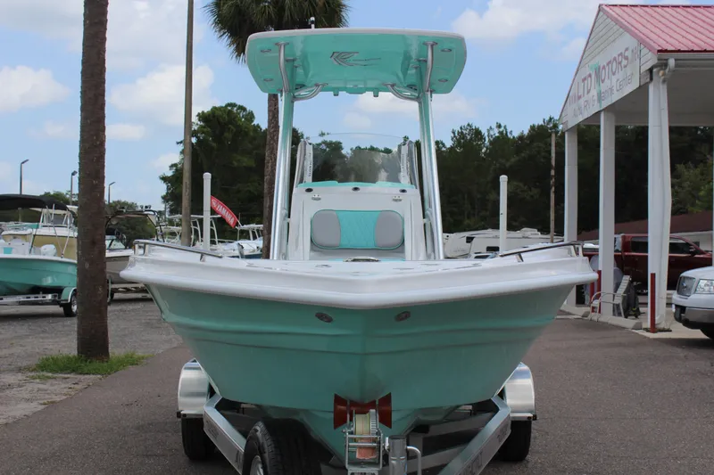 Slide: The Image of 2022 ALK2 Powerboats 25 CRX in mint green on trailer at dealership. - 4