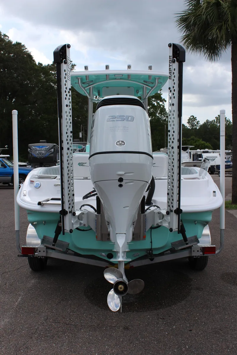 Slide: The Image of 2022 ALK2 Powerboats 25 CRX rear view with outboard motor and trailer. - 7