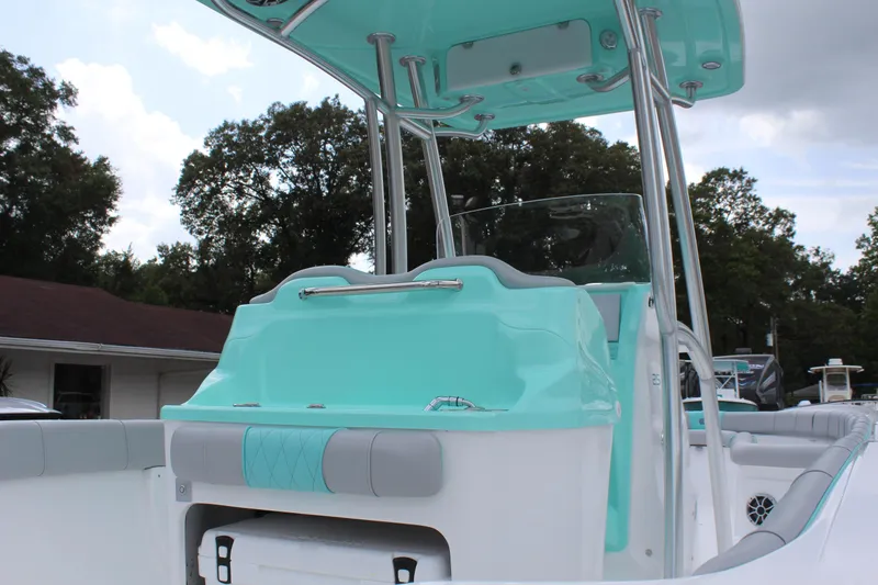 Slide: The Image of 2022 ALK2 Powerboats 25 CRX, mint green and white interior, center console. - 9