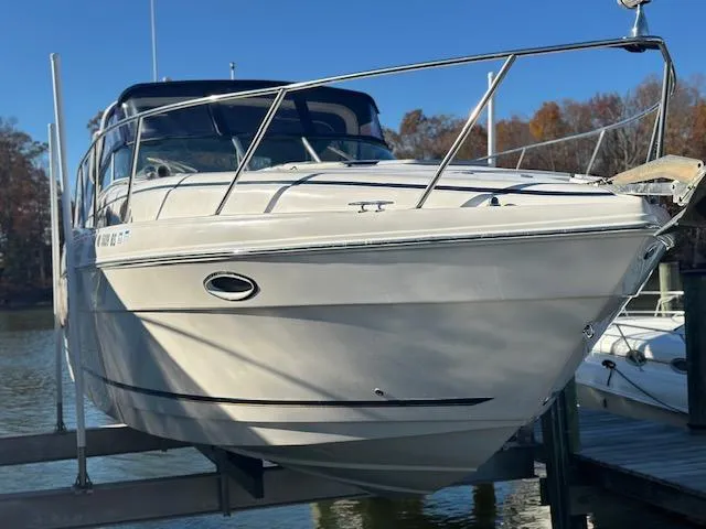 Slide: The Image of 2004 Rinker 342 Express Cruiser docked on a sunny day. - 4