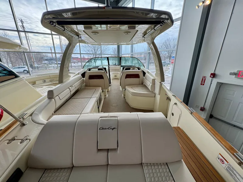 Slide: The Image of 2023 Chris-Craft Launch 31 GT boat interior with luxurious seating and modern design. - 6