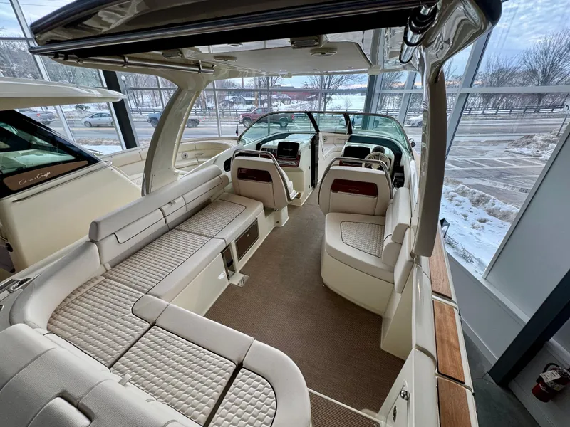 Slide: The Image of 2023 Chris-Craft Launch 31 GT interior with luxurious seating and modern design. - 7