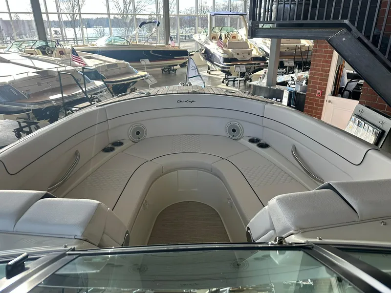 Slide: The Image of 2024 Chris-Craft Launch 28 GT boat interior in showroom. - 15