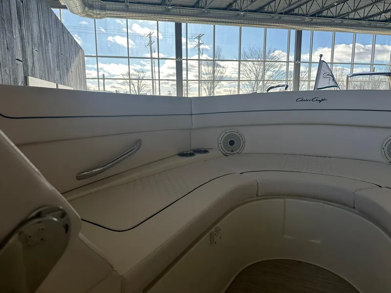 Slide: The Image of 2024 Chris-Craft Launch 28 GT interior seating with luxurious white upholstery. - 16