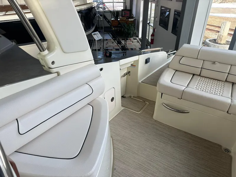 Slide: The Image of Interior of 2024 Chris-Craft Launch 28 GT, featuring luxurious seating and modern design. - 25