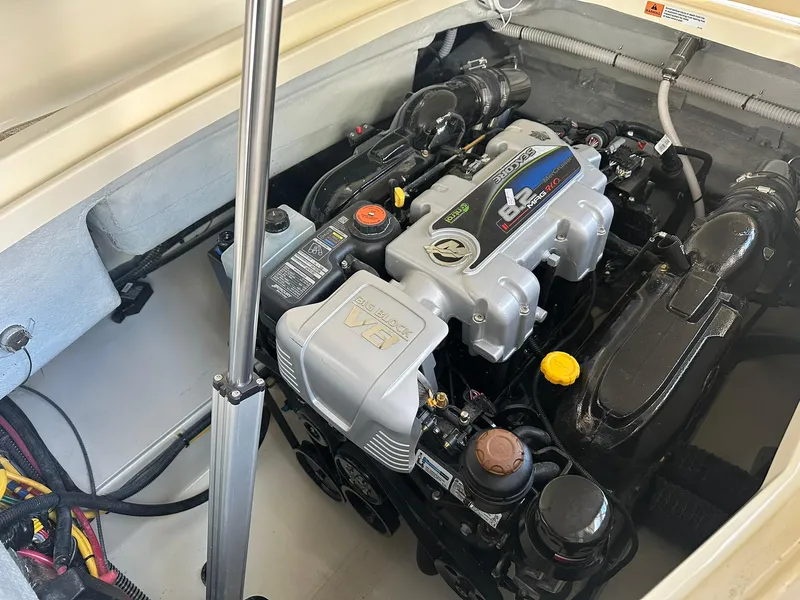 Slide: The Image of 2024 Chris-Craft Launch 28 GT engine compartment with powerful inboard motor. - 28