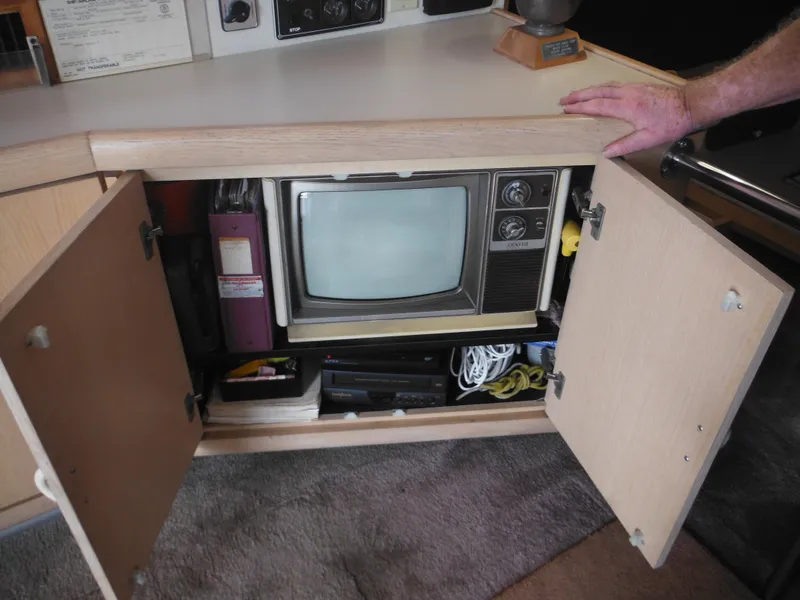 Slide: The Image of Vintage TV in cabinet on 1990 Silverton 34 Convertible boat. - 39