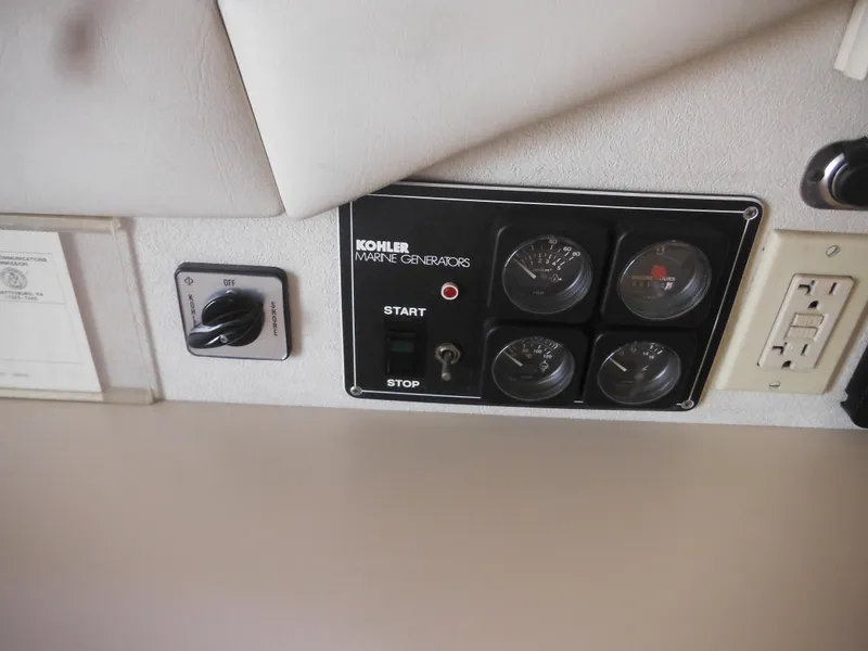 Slide: The Image of Control panel of a 1990 Silverton 34 Convertible boat. - 44