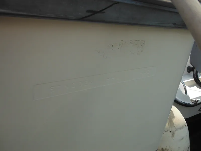 Slide: The Image of 1990 Silverton 34 Convertible boat hull identification number. - 6