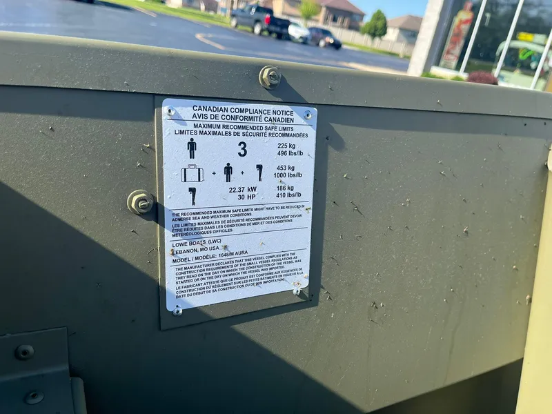 Slide: The Image of Compliance notice on 2024 Lowe Jon L1648M Aura boat. - 5