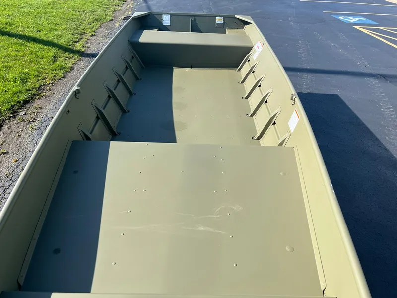 Slide: The Image of 2024 Lowe Jon L1648M Aura boat interior, empty and ready for customization. - 9