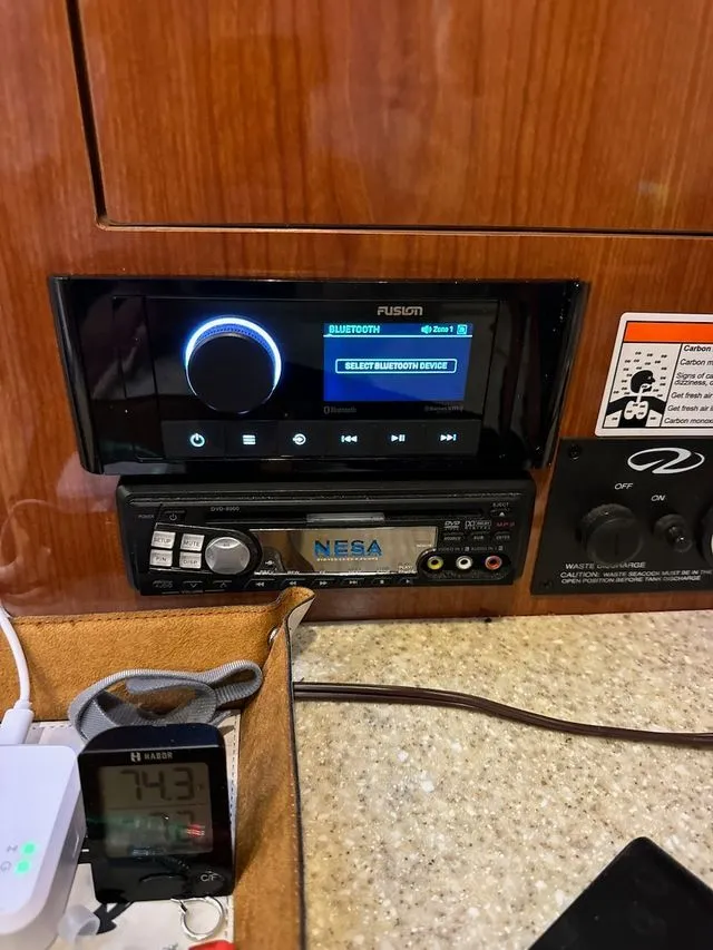 Slide: The Image of Regal 3360 boat console with Bluetooth and audio controls. - 12