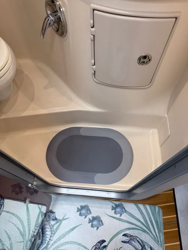 Slide: The Image of Bathroom in 2008 Regal 3360 Window Express boat. - 16