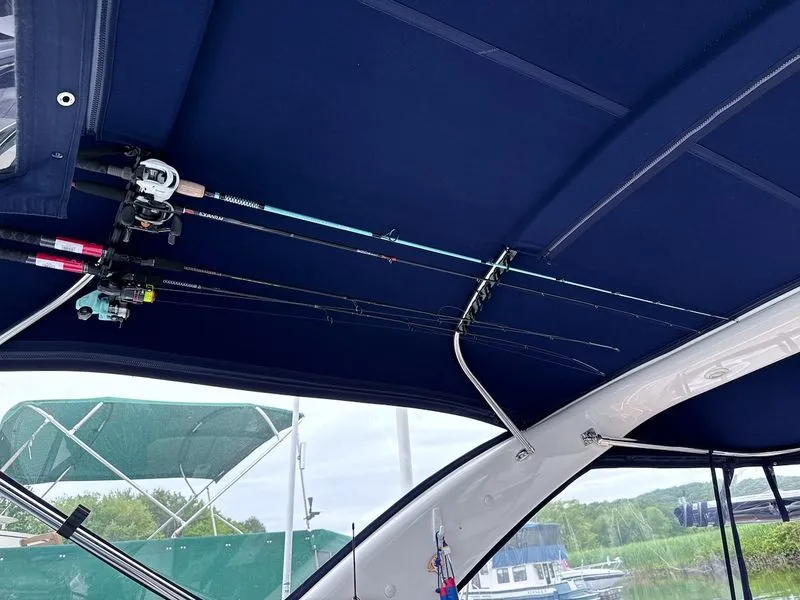 Slide: The Image of Fishing rods on a 2008 Regal 3360 Window Express boat. - 20