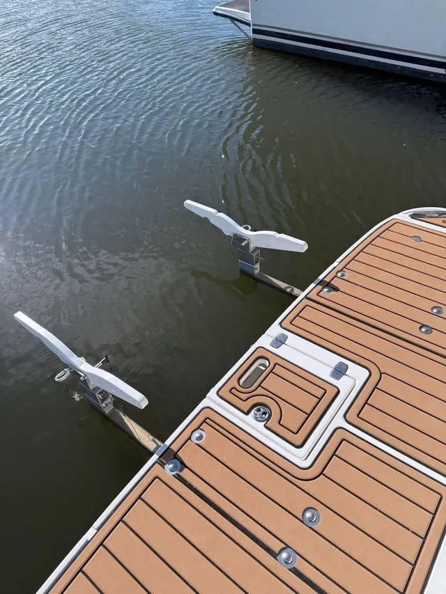 Slide: The Image of Regal 3360 Window Express 2008 boat dock with wood finish. - 21