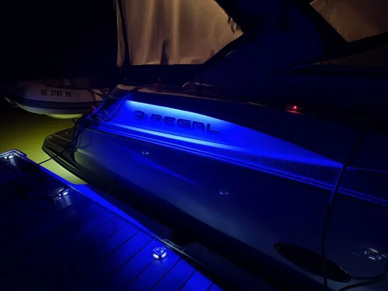 Slide: The Image of 2008 Regal 3360 Window Express boat with blue lighting. - 4