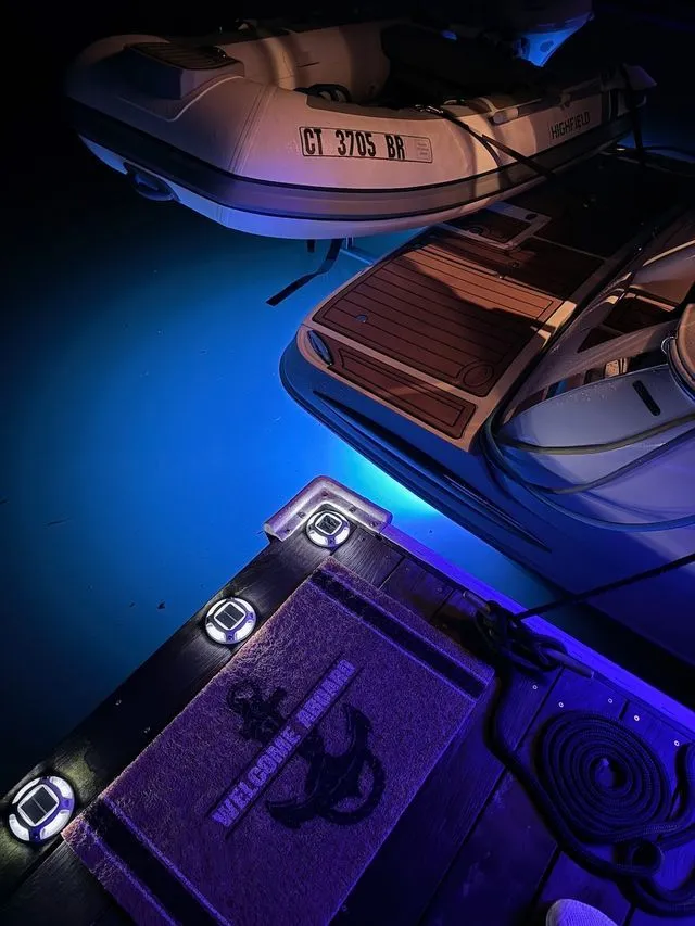 Slide: The Image of Regal 3360 Window Express 2008 at night with blue lighting. - 5