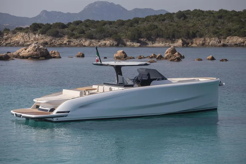 Slide: The Image of 2025 Solaris Power 44 Open yacht in serene coastal waters. - 3