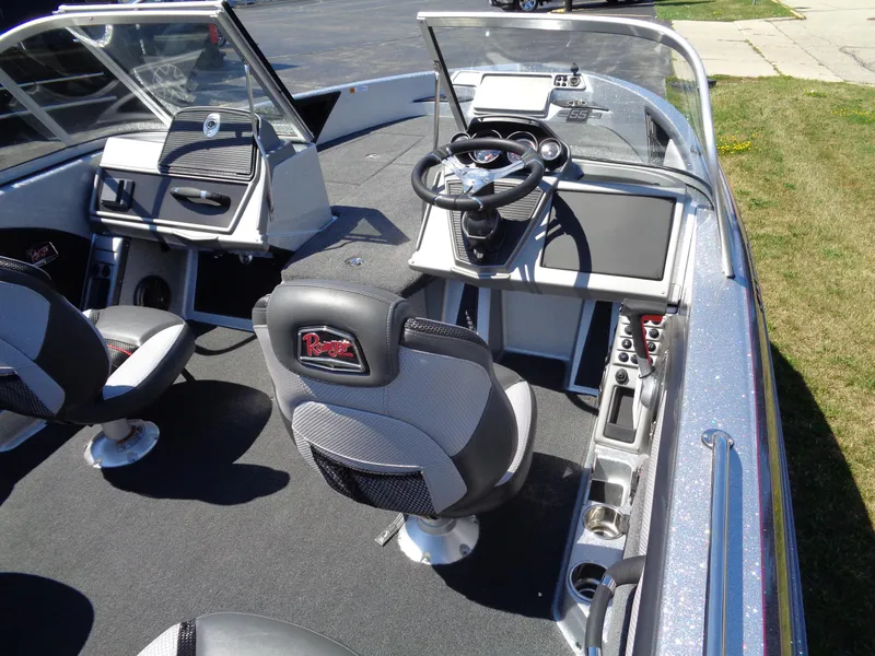 Slide: The Image of 2023 Ranger 1880 MS Angler boat interior with steering console and seating. - 10