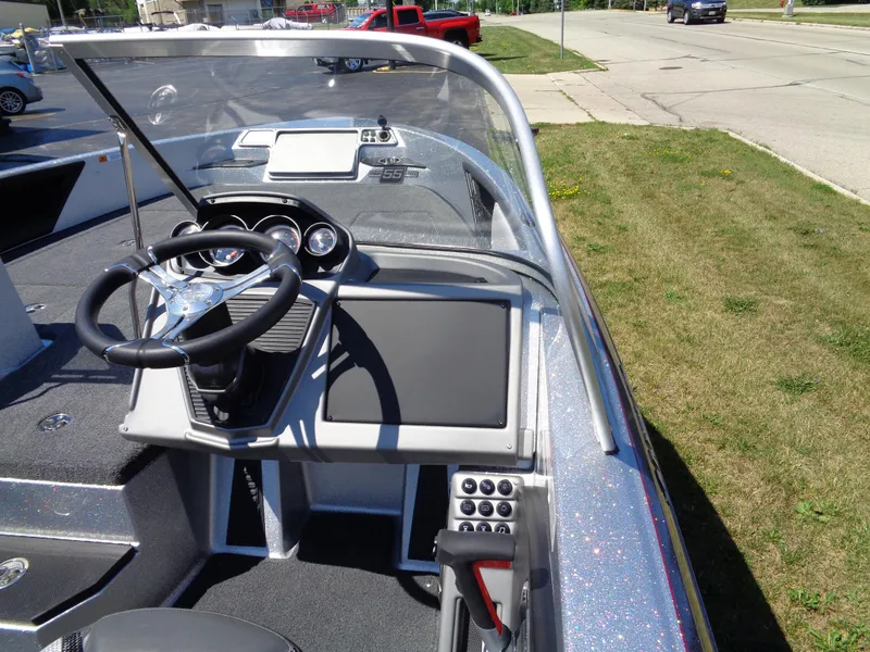 Slide: The Image of 2023 Ranger 1880 MS Angler boat dashboard and steering wheel on display. - 11