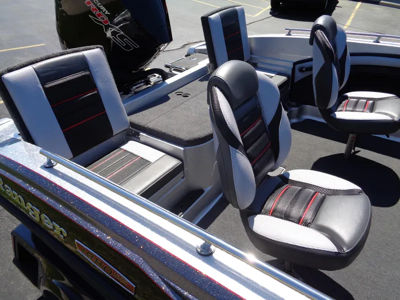 Slide: The Image of 2023 Ranger 1880 MS Angler boat interior with black and gray seating. - 13