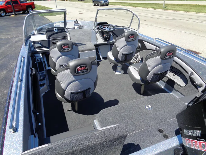 Slide: The Image of 2023 Ranger 1880 MS Angler boat interior with four seats and steering console. - 16