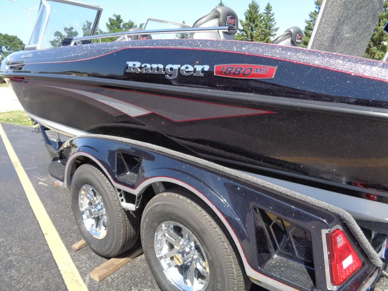 Slide: The Image of 2023 Ranger 1880 MS Angler boat on a trailer, side view. - 17